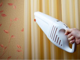 How to clean blinds and other window coverings? | Saratoga CA Demonstrating eco-friendly cleaning with a vinegar solution on window blinds.