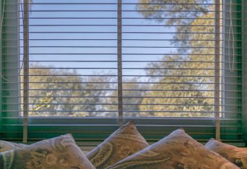 Cordless blinds and shades installed on windows for a modern, hassle-free look.