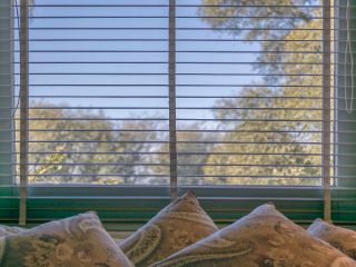 Cordless blinds and shades installed on windows for a modern, hassle-free look.